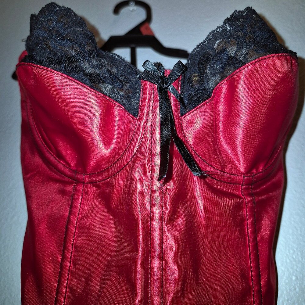 Red  vintage corset with black lace trimming